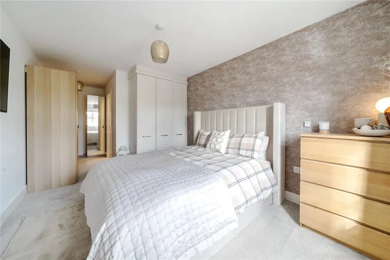 On the first floor is the master bedroom with its own dressing room and en-suite.