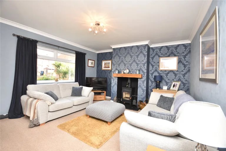 On the ground floor you will find this stylish living room.