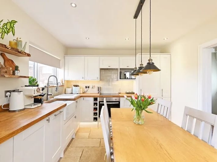 The kitchen/diner provides access to the rear garden. It is very spacious and includes a whole lot of storage space.