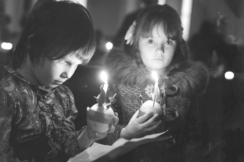 Denise Cavanagh, 7 (left) and Julie Warden, 6 from St John's Church of England Primary School joined in with carol singing in December 1973.