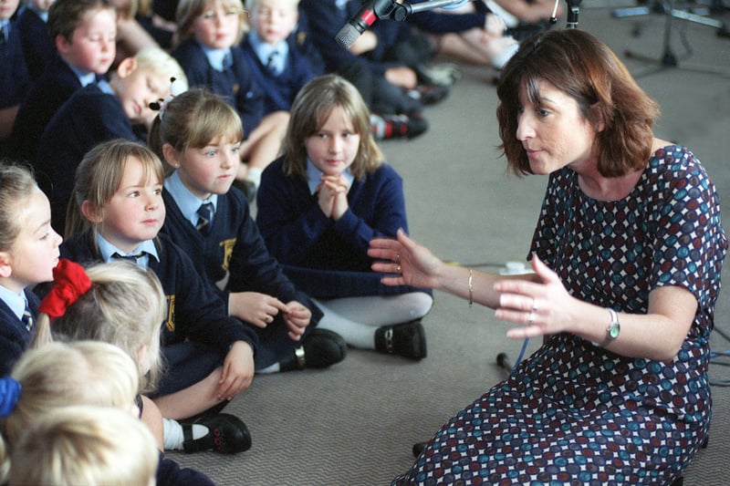 Music teacher Jenny Stuart, goes through the lyrics of The New Millennium  which pupils were recording at the West Park Centre in October 1999.
