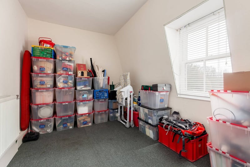 This storage room could also be used as a study. The property also has a double garage with electric up-and-over door and ample off-street parking.