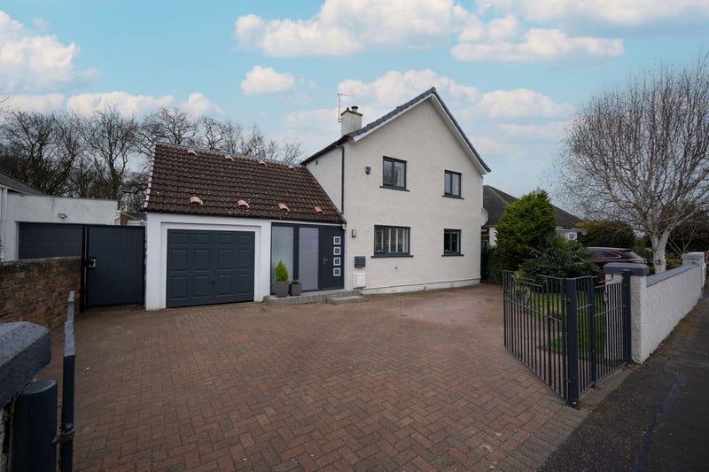 To the front of the house, there is a paved driveway which provides off-street parking for two cars. The driveway leads to a single garage with lighting, access to the sitting room and a gate to the rear garden.