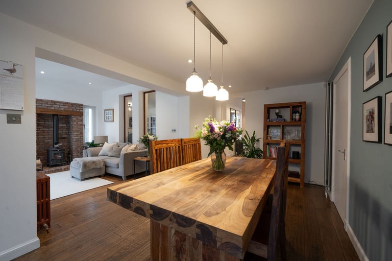 This dining area off the kitchen has plenty of space for a large dinner table, perfect for family meals and socialising.