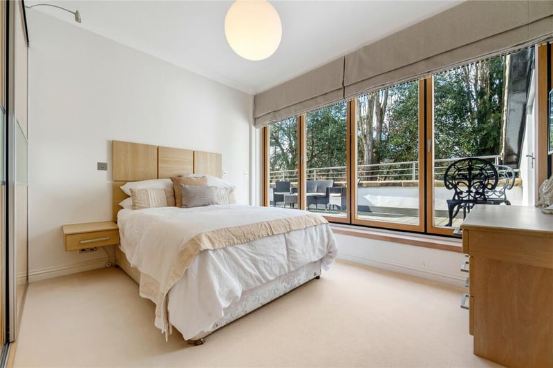 The second bedroom offers direct access to the large private terrace.