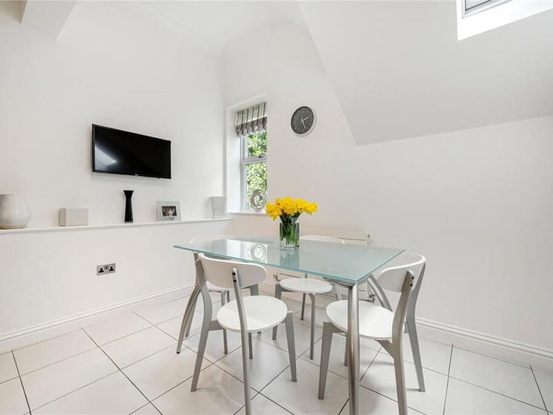 Here is also lots of room for a large dining table to gather family and friends around.