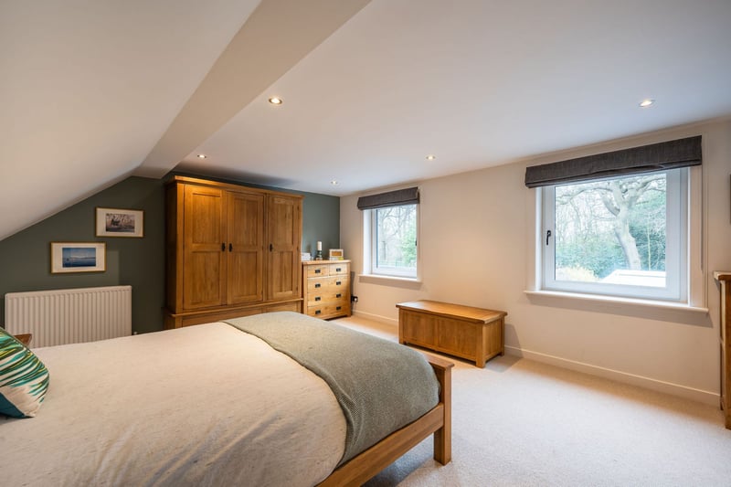 The large master bedroom with en-suite shower room and beautiful views over the garden.