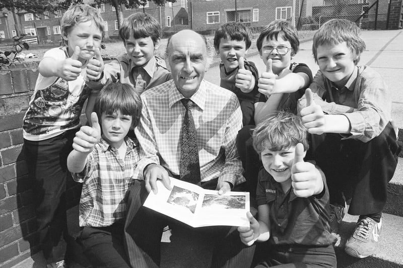 Teacher Ken Howard was surrounded by a group of thrilled pupils at Quarry View School in June 1980 - because he was taking them all on a trip to Middleton Camp.