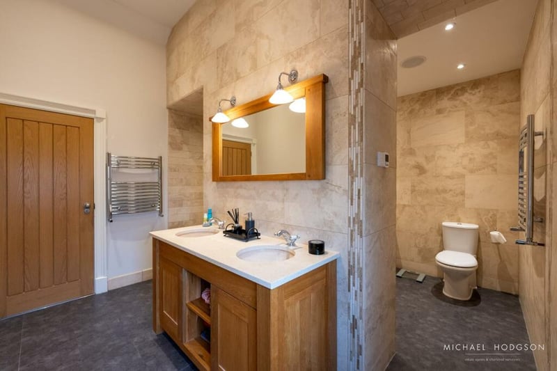 The property boasts three bathrooms, which include a main family bathroom and two ensuite bathrooms.