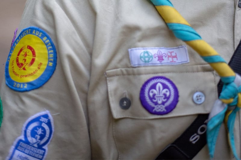The scout badges came with childhood trophies, medals, and a Blue Peter Badge.