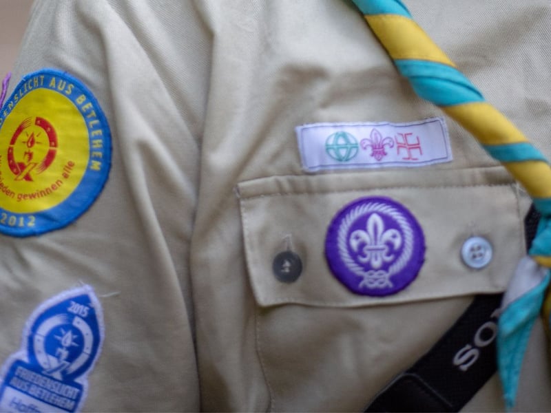 The scout badges came with childhood trophies, medals, and a Blue Peter Badge.
