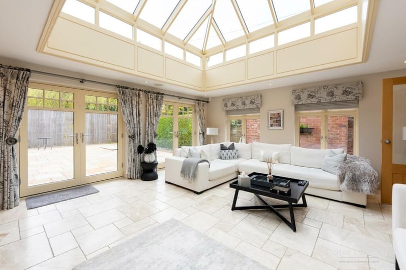Complete with underfloor heating, the orangery provides a bright and relaxing space for all seasons, with French doors leading to the rear garden of the property.