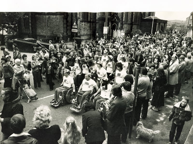 Mick Kelly, Terry Willett and Derek Curson are welcomed home warmly in May 1979 after their epic week-long London to Stocksbridge wheelchair marathon in aid of the British Paraplegic Society which was started by
Prince Charles at Buckingham Palace