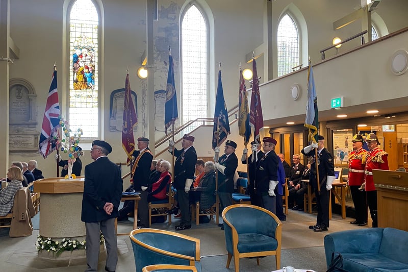 A parade with standard bearers and members of several South Yorkshire veteran and ex-forces organisations was organised with a plan to march to Sgt Loosemoore's grave, but poor weather moved the ceremony indoors.