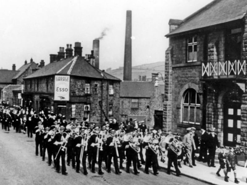 A brass band parade along Manchester Road, Stocksbridge, some time between 1920 and 1939