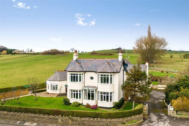 Riffa House is a beautifully designed family home with two cottages near Leeds.