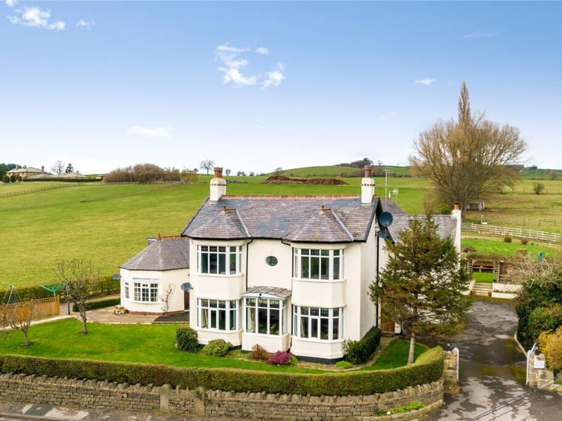 Riffa House is a beautifully designed family home with two cottages near Leeds.