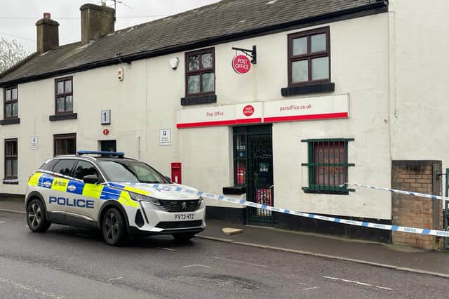 Hackenthorpe Post Office surrounded by police tape on Wednesday. Police have confirmed two men armed with sledgehammers entered the premises and tried to break into the safe.