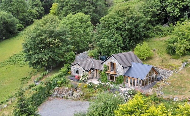 The cottage in Llangynog, Mid Wales is nestled into the hillside. Picture: Rightmove