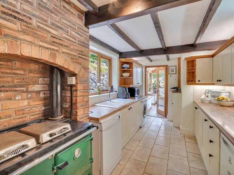 The country cottage kitchen is just as you would expect when stepping into the property. Picture: Rightmove