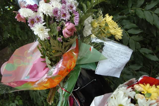 Flowers left as a tribute to Safrajur Jahangir, who was shot dead in August 2009