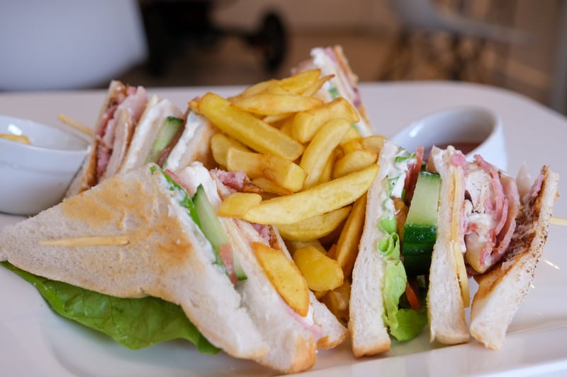 The cafe prides itself on affordable prices. Pictured is the 'Toast Tower', described on the menu as toasted bread layered with mayo, lettuce, tomato, turkey, cheese, bacon, chicken, and served with chips. It is priced at £11.50
