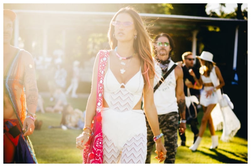 OMG! Supermodel Alessandra Ambrosio stunned at Coachella in 2022 in a white crochet jumpusit and accessorised with a red tote bag