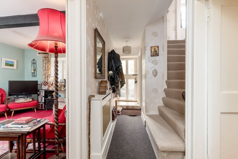 The hallway, leading through to the rear garden with handy downstairs cloakroom with window, period style radiator, sink and wc. The main staircase takes you up to the landing with an access hatch to the loft which houses the water tank and has a ramsay ladder, is partially floored and insulated.