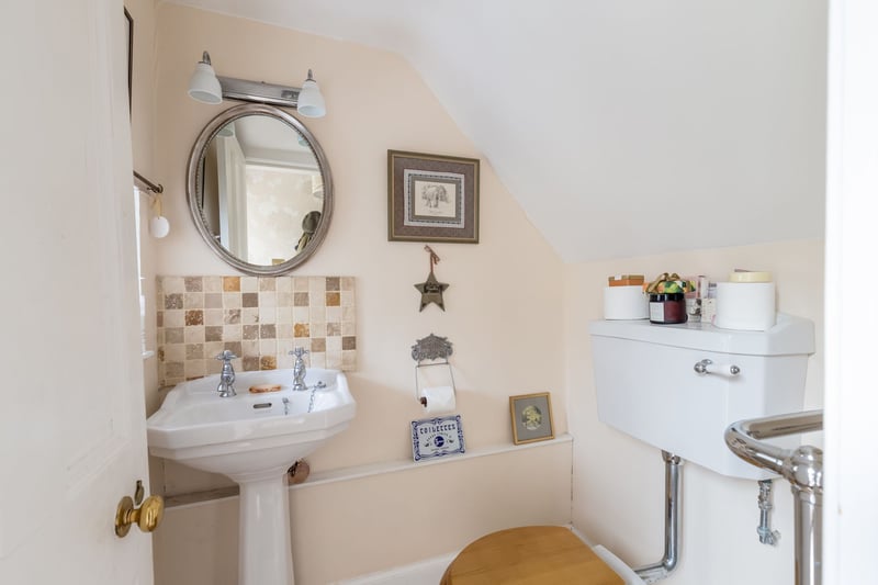 The handy downstairs toilet. There is also a basement cellar, accessed from the front garden and also the lane, formed of two spaces - one housing the boiler and the other for storage and has a clothes pulley.