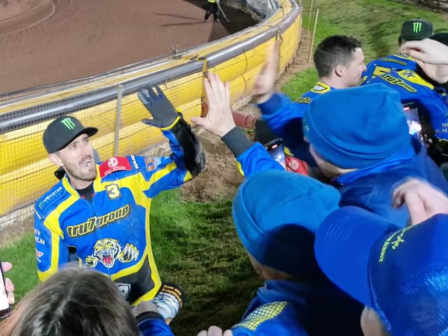 Chris Holder celebrates with Sheffield fans after the Tigers win at Leicester, which saw him and his brother Jack in heat 15 5-1 to clinch the victory. ,Photo: David Kessen, National World