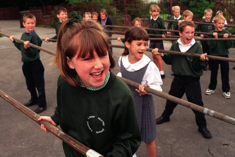 Pupils try a pike attack during the Civil War display at their school in July 1997.