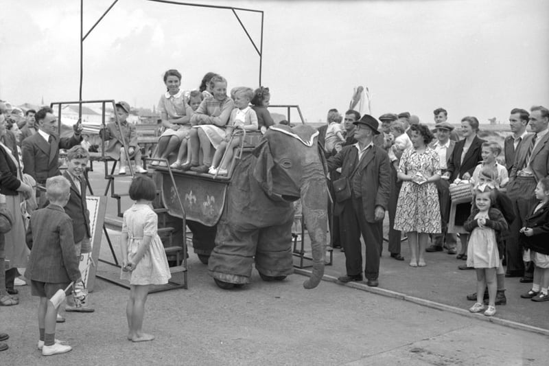 Riding on a Mechanical Elephant 1950.