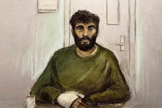 Court artist sketch by Elizabeth Cook of Hassan Jhangur, appearing via video link from HMP Doncaster, during a an earlier hearing at Sheffield Crown Court where he is charged with the murder of father-of-two Chris Marriott. Mr Marriott died after being hit by a car while trying to help a stranger in Sheffield. Jhangur is also charged with five counts of attempted murder. Image by Elizabeth Cook/PA Wire
