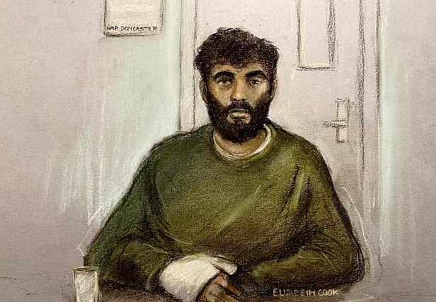 Court artist sketch by Elizabeth Cook of Hassan Jhangur, appearing via video link from HMP Doncaster, during an earlier hearing at Sheffield Crown Court where he is charged with the murder of father-of-two Chris Marriott. Mr Marriott died after being hit by a car while trying to help a stranger in Sheffield. Jhangur is also charged with five counts of attempted murder. Image by Elizabeth Cook/PA Wire