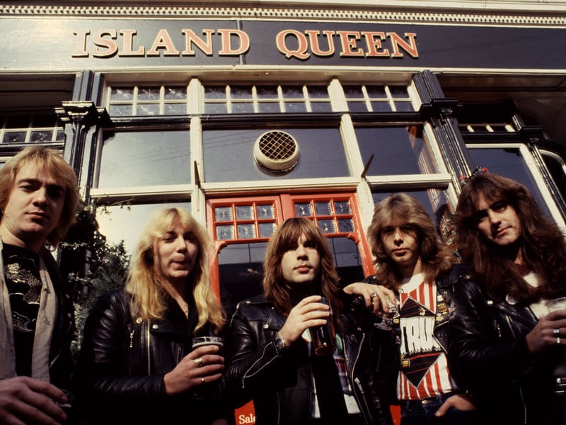 Heavy metal legends Iron Maiden - guitarist Adrian Smith, guitarist Dave Murray, singer Bruce Dickinson, drummer Clive Burr and bassist Steve Harris - outside the Island Queen pub in Islington in 1982. 