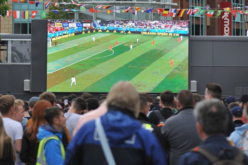 The action unfolds on the big screen with hundreds of fans watching the match in Park Lane in 2018.