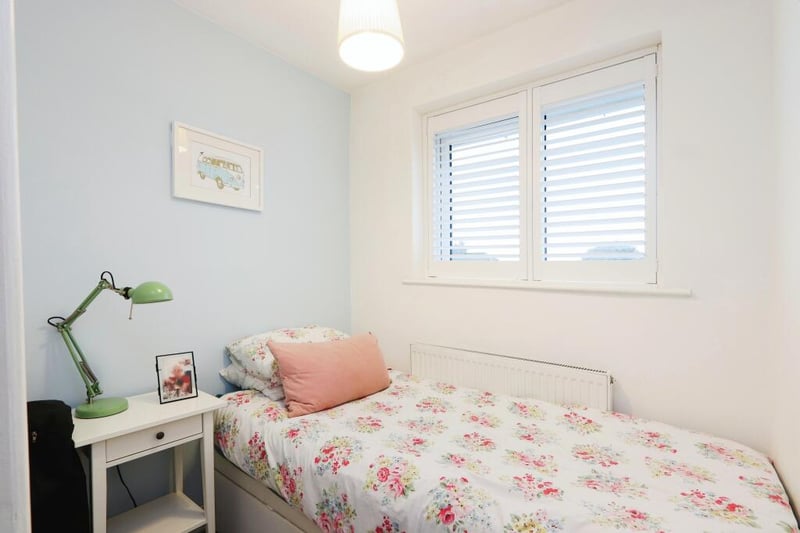 The smallest bedroom of the three is perfect as a child's room, or could be used as an office space.