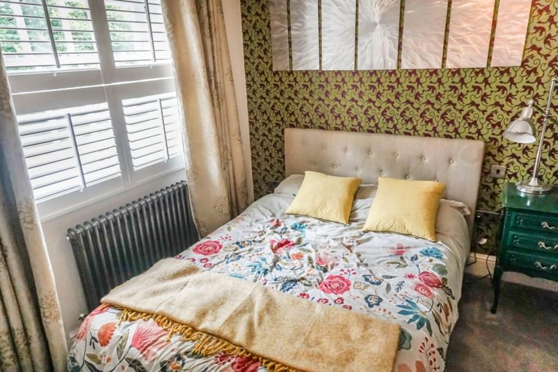 The fourth bedroom has a bright and cosy design.