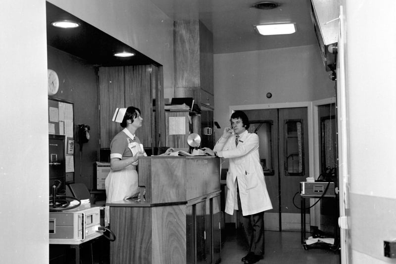 A doctor and nurse at the Coronory Care Unit reception desk in the Royal Infirmary Edinburgh in January 1973.