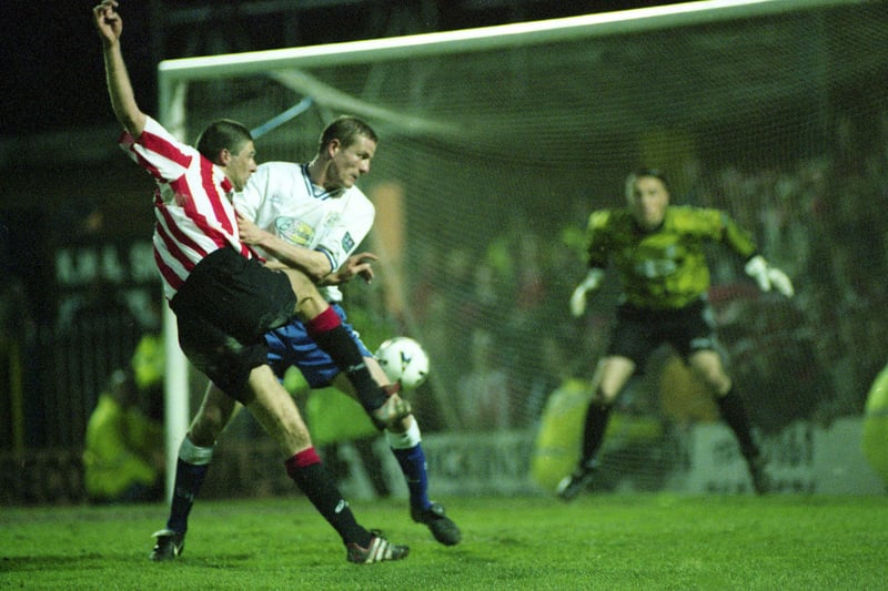 Niall terrorises the Bury defence once more in this attack in 1999.