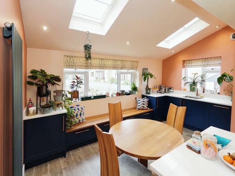 The kitchen/diner is large and covered with bright colours.