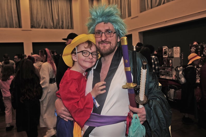 Jonathon Lee and four-year-old Sabastion celebrated at this year's anime extravaganza.