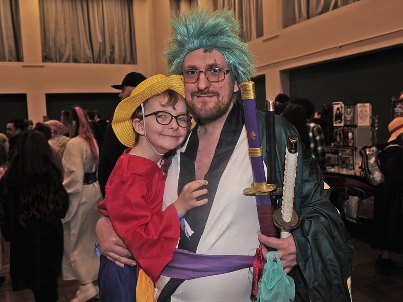 Jonathon Lee and four-year-old Sabastion celebrated at this year's anime extravaganza.