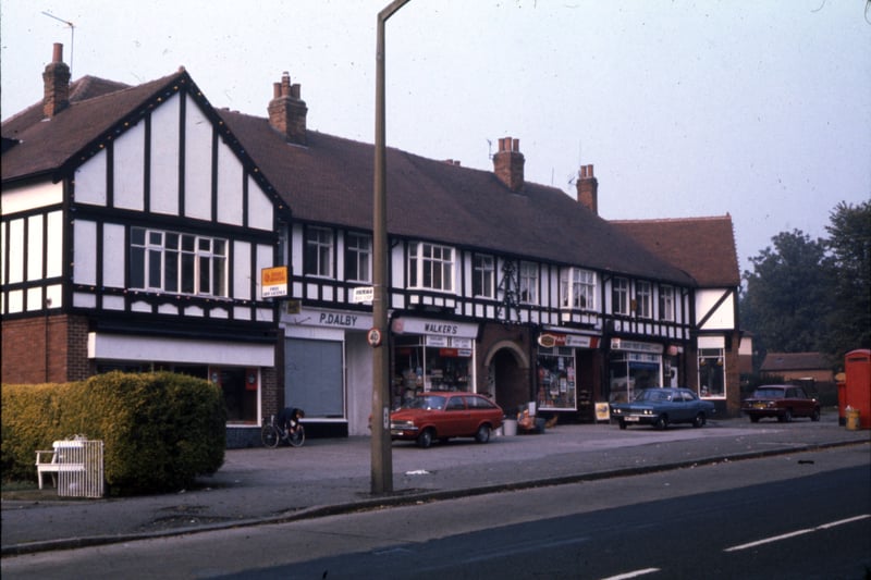 Shops on Stonegate Road between Parkland Crescent and Parkland Drive in 1977. They include P. Dalby, Walker’s, Spar and a Post Office.