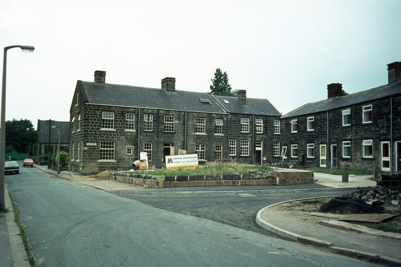 Houses on Tannery Square off Green Road, seen on the left in August 1975 Construction work by Manning Construction is in progress. Tannery Square had been scheduled for demolition as part of the Green Road area slum clearance plan and all the residents were moved out, but instead the houses were saved and given a complete renovation.