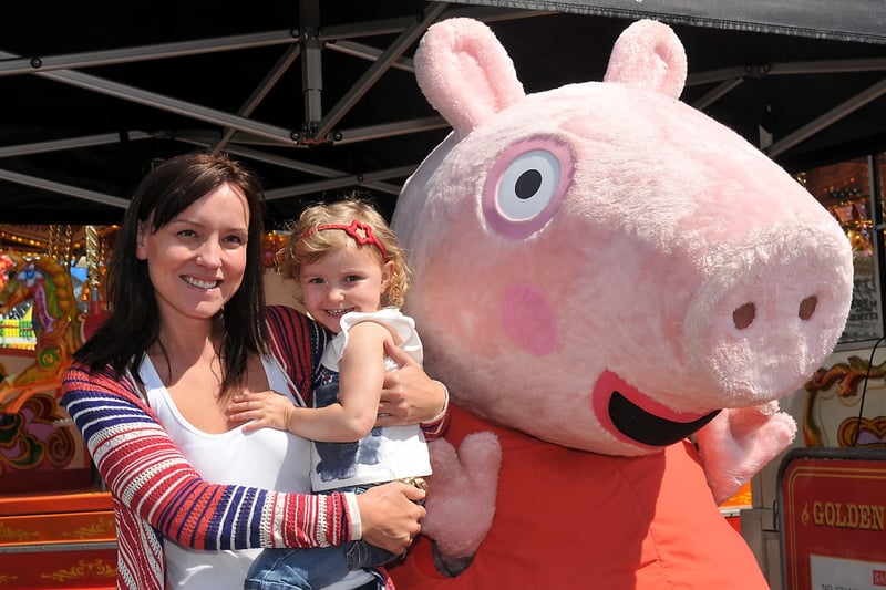 Children's TV character Peppa Pig met two-year old Darcy Carter and her mum June at the funfair at the Stadium of Light in July 2011.