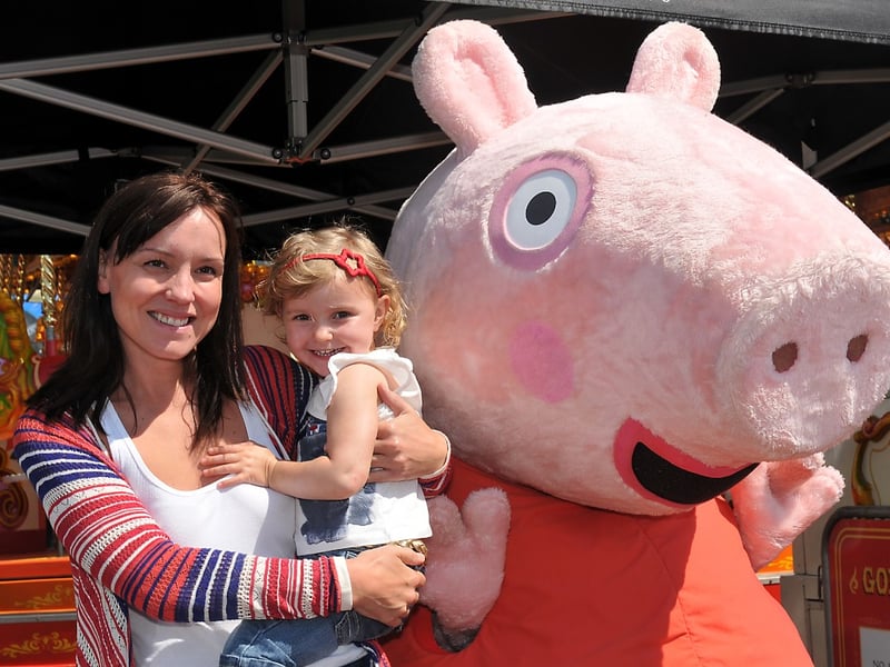 Children's TV character Peppa Pig met two-year old Darcy Carter and her mum June at the funfair at the Stadium of Light in July 2011.