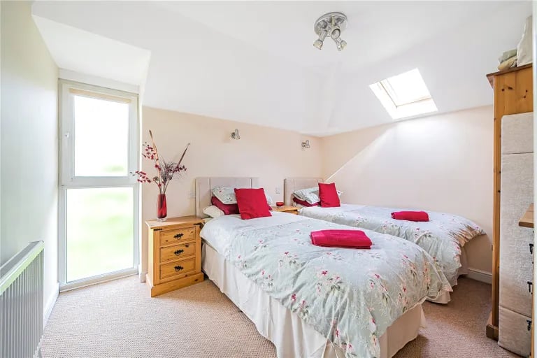 Two further bedrooms are located on the first floor, with one benefitting from its own en-suite bathroom.