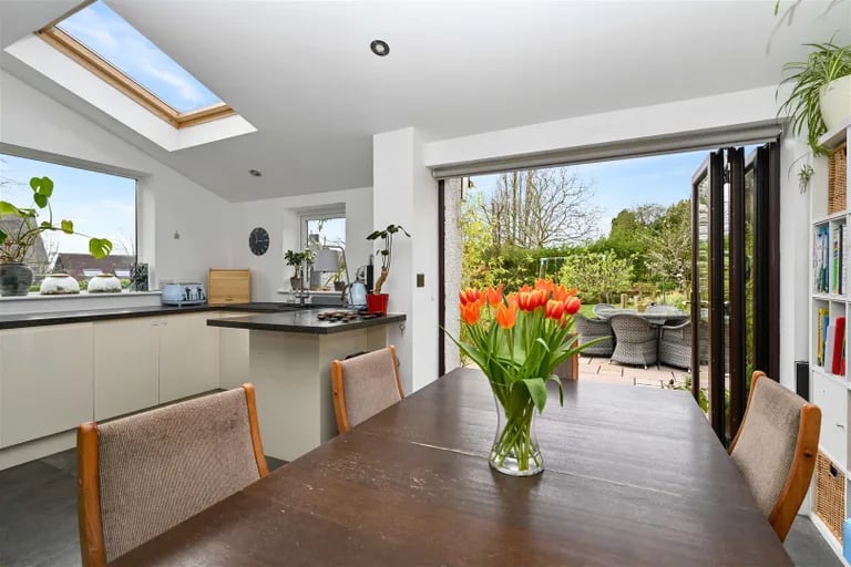The room has space for a large dining table and bi-folding doors leads right onto the rear garden patio.