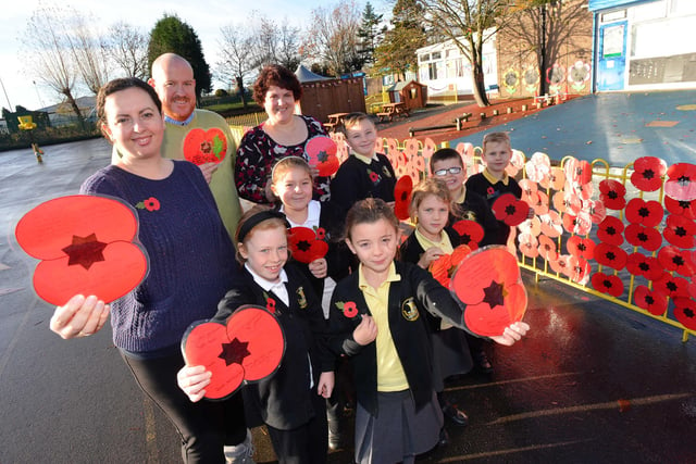 Bede Burn Primary School's remembrance display is in the picture in 2016. So are headteacher Nicola Faulkner, teaching assistant Glenn MacIntosh and class teacher Amanda Lenney.